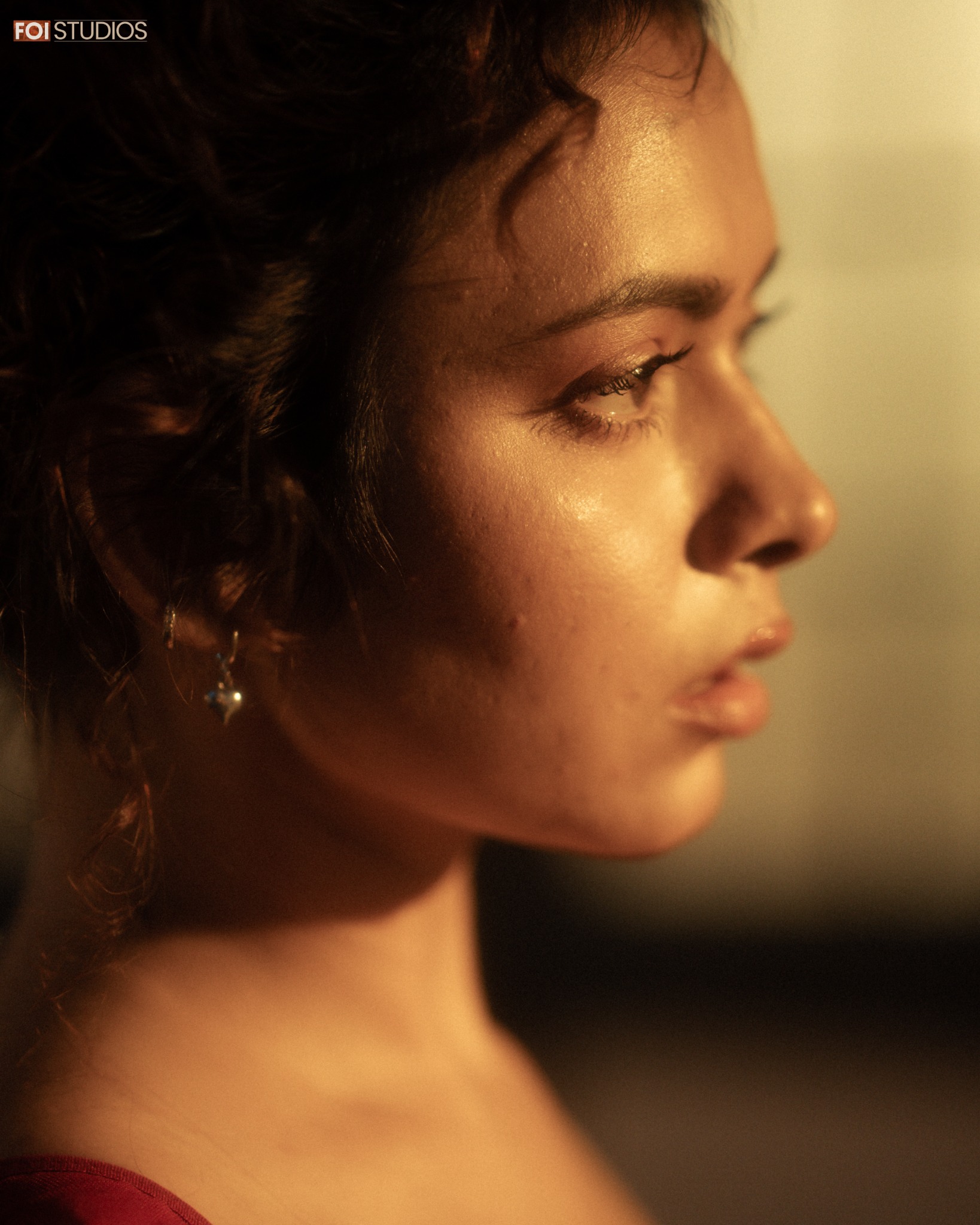 Close portrait of Aayu Choudhary in warm cinematic light