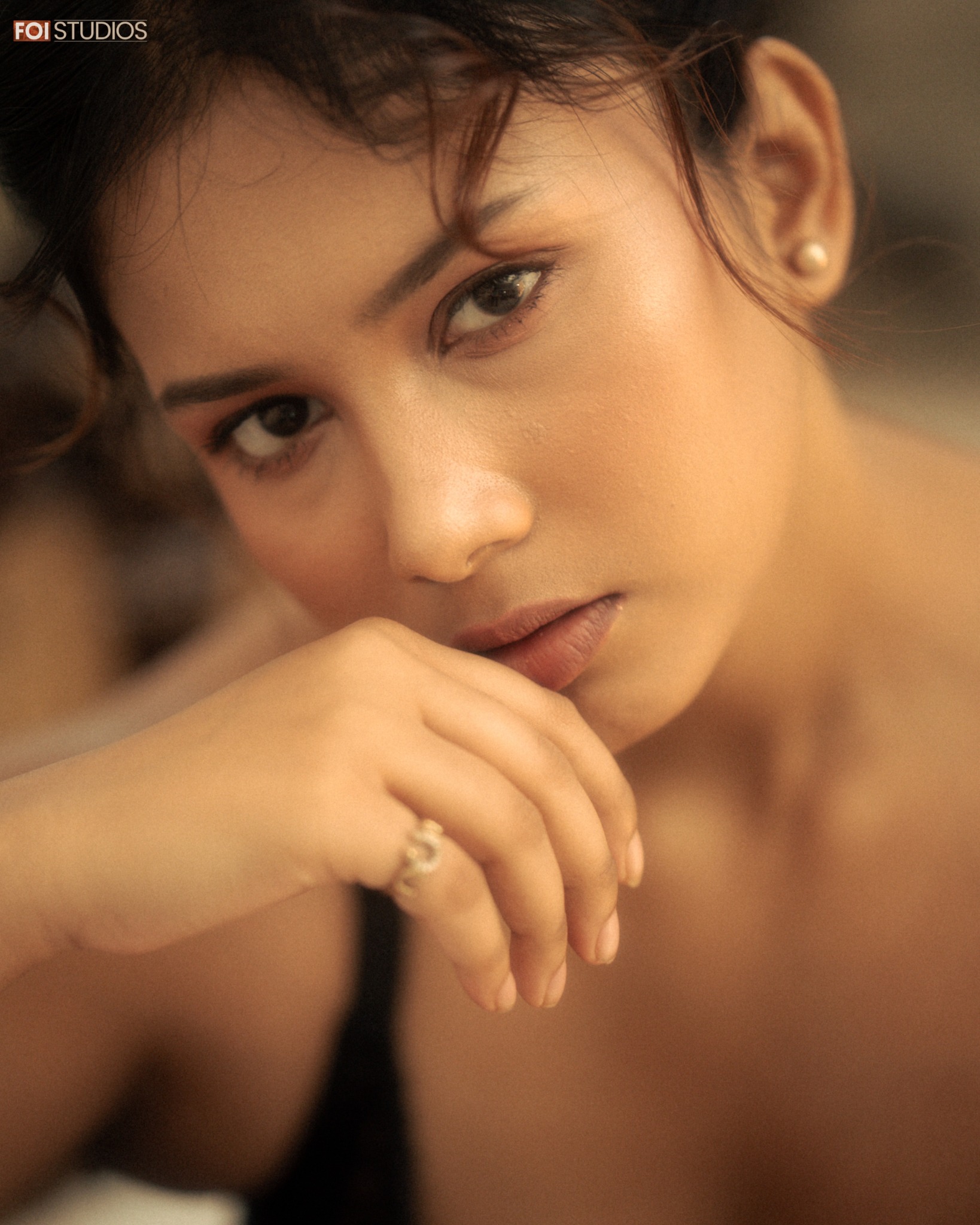 Close portrait of Poulomi in soft warm cinematic light