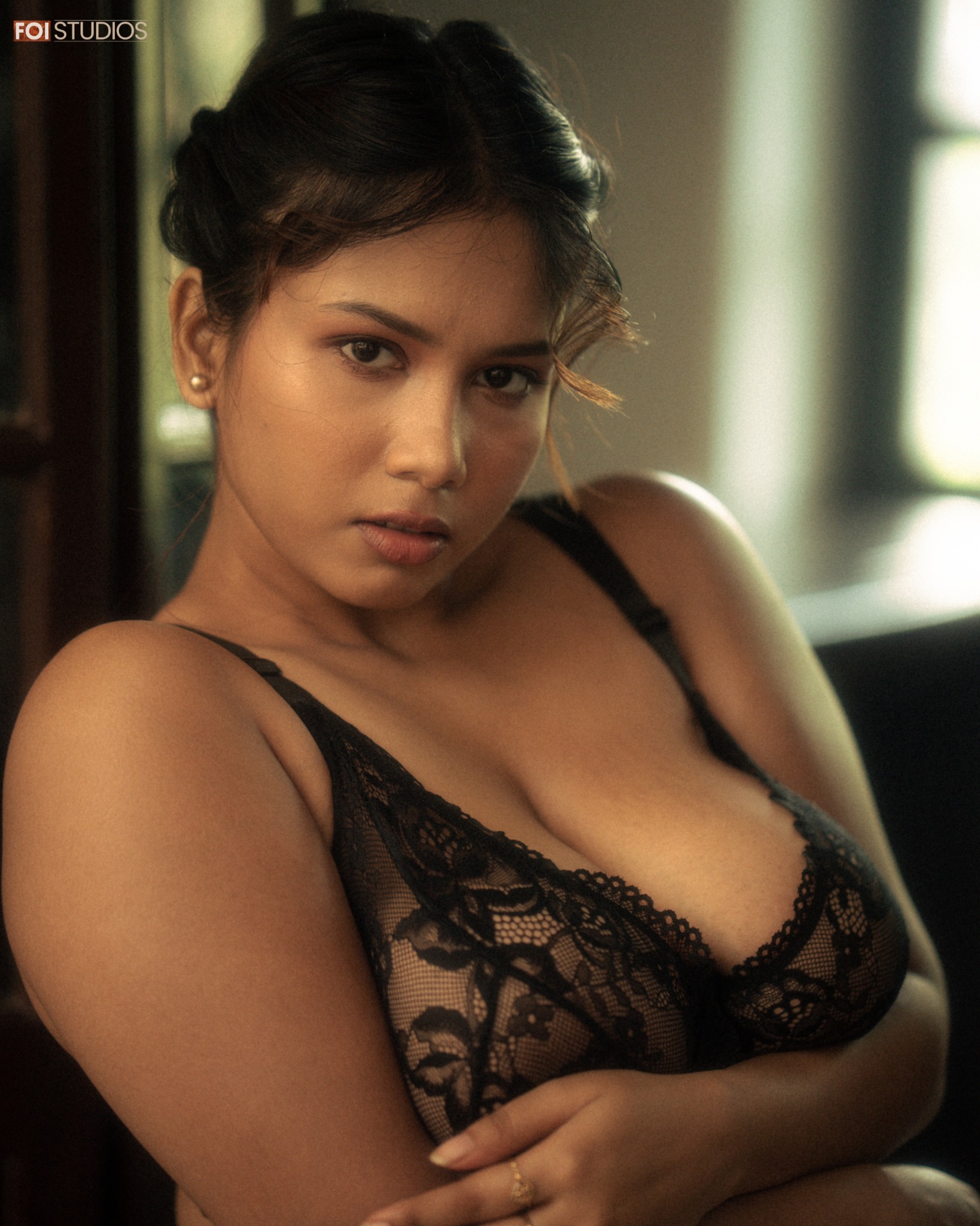 Poulomi in black lace photographed in soft cinematic window light